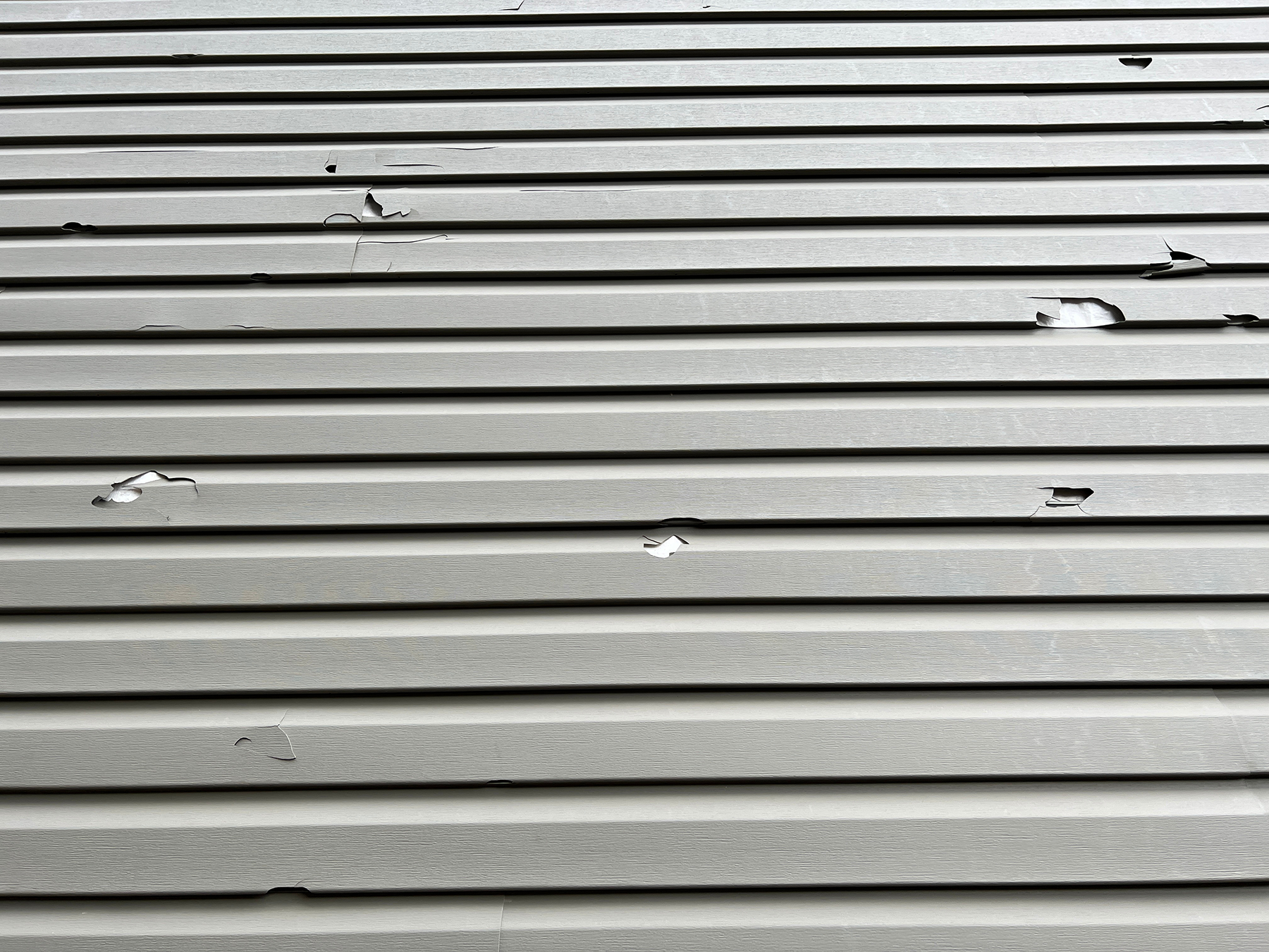 Holes in Vinyl Siding